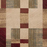 Close-up of the Maumee Brown Mosaic Performance Rug, featuring a geometric patchwork design in red, beige, brown, and olive tones. Swatch