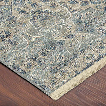 Close-up of Dalyn Marbella MB5 Mineral Blue rug showing traditional floral pattern, chestnut, denim, and gray colors.