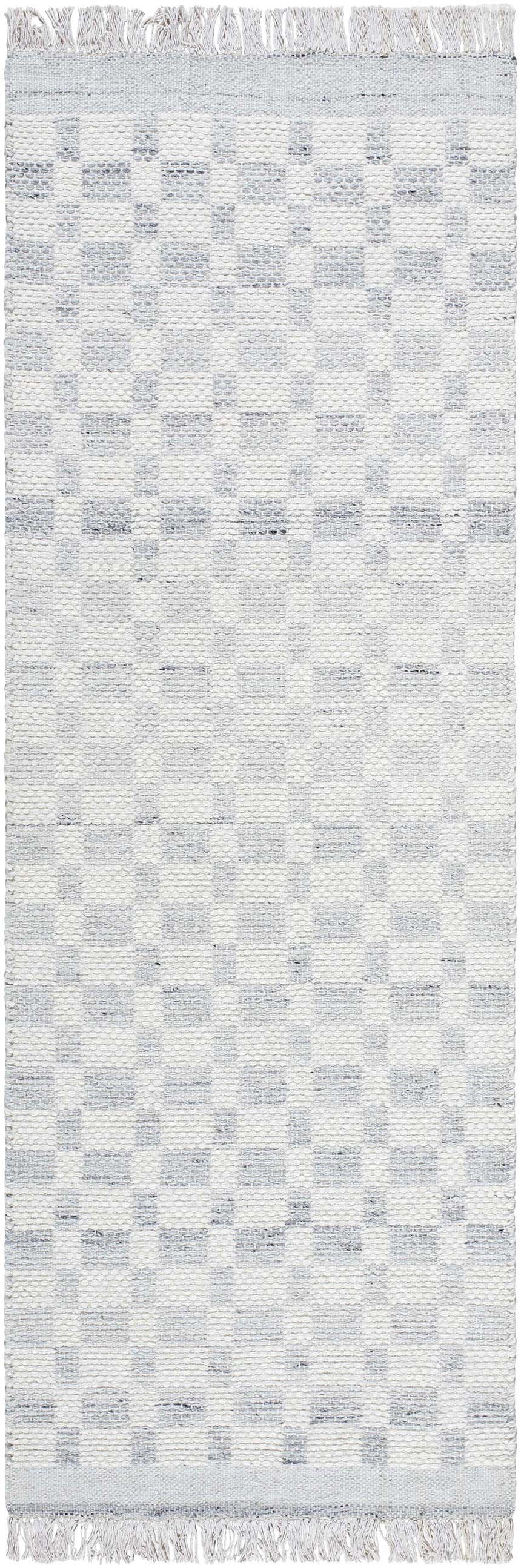 Close-up of the Meira Cream Area Rug. Hand woven wool rug with a cream and light slate geometric pattern and fringe. Design-Runner-268