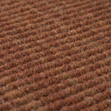 Close-up of the textured, hand-loomed Dalyn Monaco Sisal MC100 Paprika Area Rug in paprika red.