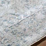 Close-up of the Melianna Gray Blue rug showing its plush texture and traditional blue, gray, and cream pattern. Texture