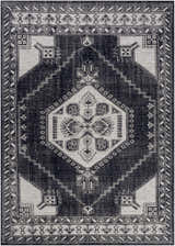 Close-up of the Minapan Premium Area Rug. Hand-knotted rug in black and cream with a traditional geometric pattern. Design-Rectangle-811