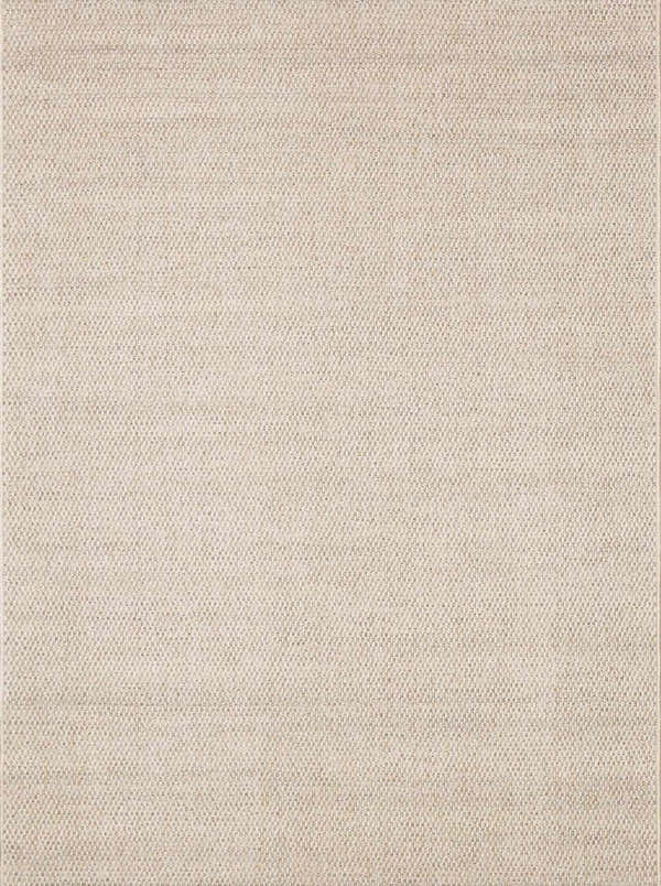 Close-up of the Midha Area Rug, showing its ivory and peach tones and subtle woven texture. Design-Rectangle