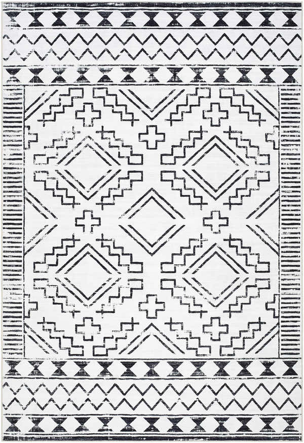 Close-up of Medan Washable Area Rug - Clearance. Black geometric Southwestern pattern on off-white polyester. Design-Rectangle-576