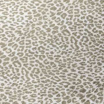 Close-up of Dalyn Mali ML2 Stone Washable Area Rug. Chestnut and ivory animal print pattern. Machine-made polyester texture.