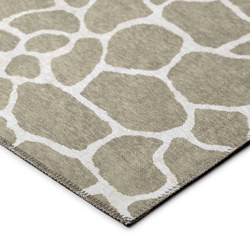 Close-up of Dalyn Mali ML4 Stone Washable Area Rug. Chestnut and ivory organic shapes pattern. Non-skid polyester rug.