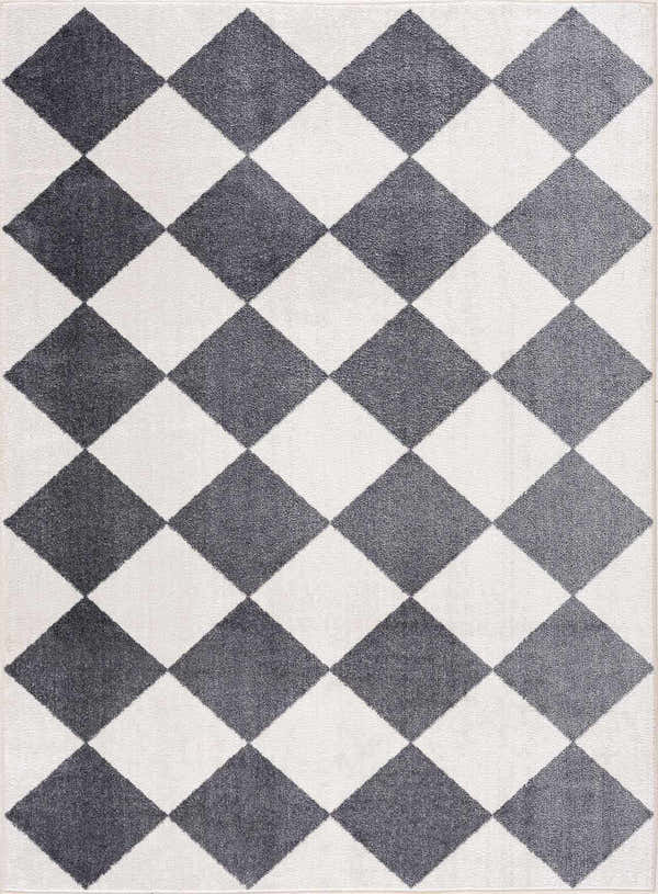 Close-up of the Ulric Navy Blue Diamond Washable Area Rug, featuring a geometric diamond pattern in navy and off-white. Design-Rectangle-537