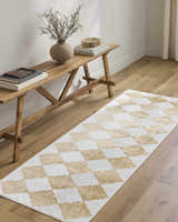 Entryway scene with a wood bench and the Ulric Light Brown Diamond Washable Area Rug runner on wood floors. Roomscene-Runner