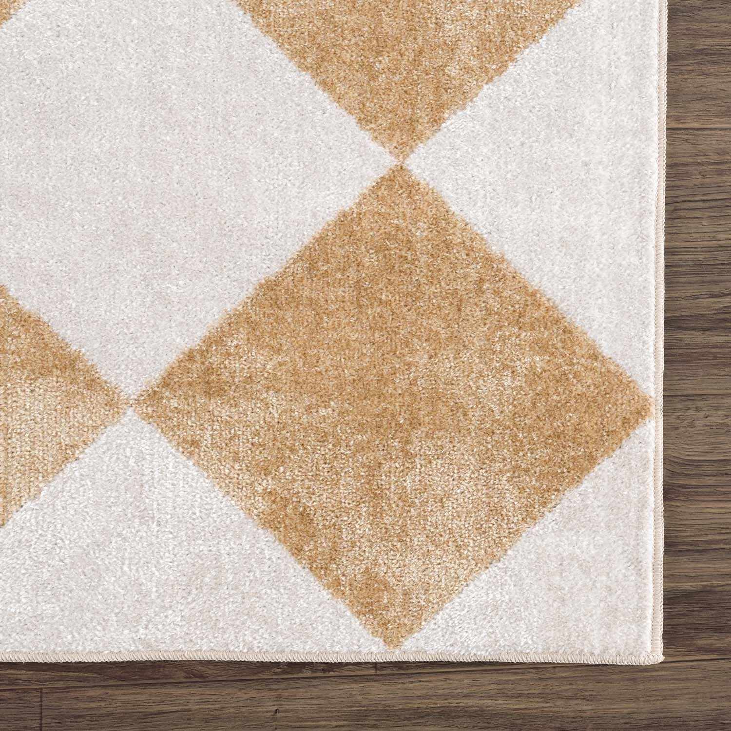Close-up of the Ulric Light Brown Diamond Washable Area Rug, showing cream and light brown diamond pattern and soft texture. Swatch