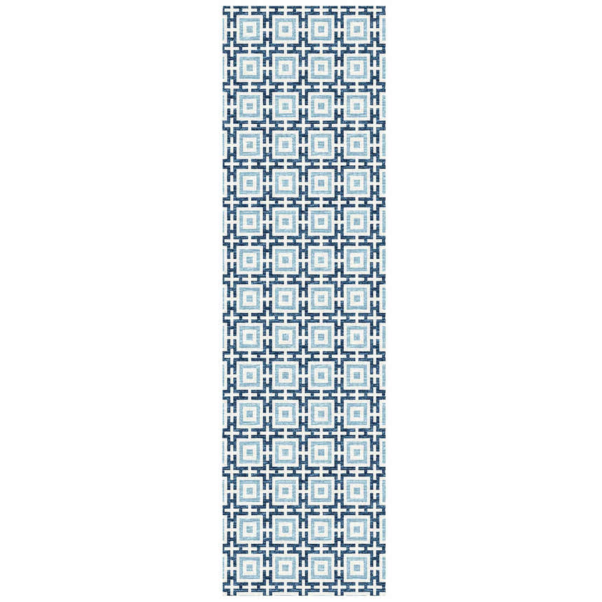 Close-up of the Dalyn Marlo MO1 Navy Washable Area Rug featuring a geometric square pattern in navy, denim, and white.