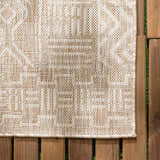 Close-up of the Epson Dark Beige Indoor & Outdoor Area Rug, showing its woven texture and geometric pattern. Swatch