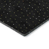 Close-up of the Dalyn Luxury Merry & Bright MY11 Black Washable Area Rug with gold and white polka dot pattern.