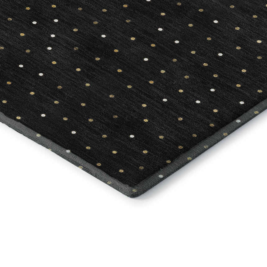 Close-up of the Dalyn Luxury Merry & Bright MY11 Black Washable Area Rug with gold and white polka dot pattern.