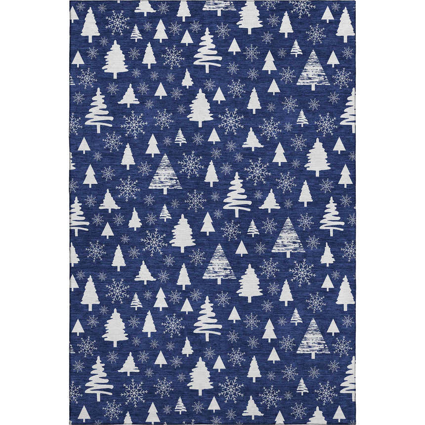 Close-up of the Dalyn Luxury Merry & Bright Navy Washable Area Rug featuring white Christmas trees and snowflake pattern.
