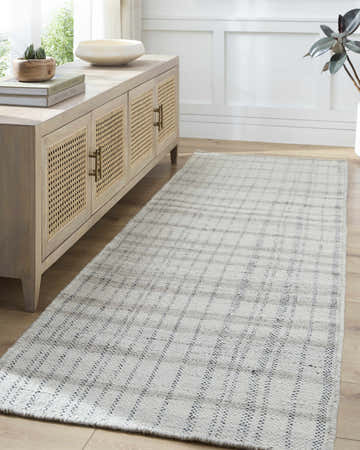 Entryway with light wood console table and Nissa Gray Blue Checkered Wool Rug runner on wood floor. Roomscene-Runner
