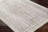 Close-up of Usonia Machine Woven USO-2304 Area Rug. Contemporary style with dark red, gray, and white geometric pattern. Corner