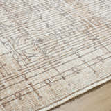 Close-up of the Usonia Machine Woven Frank Lloyd Wright USO-2304 rug. Features a geometric design in dark red, gray, and white. Texture