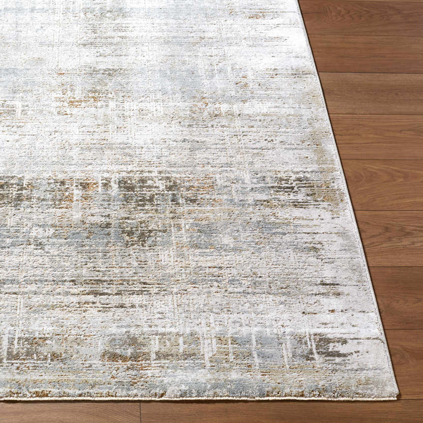 Close-up of Neron Blue Gray Thick Luxe Abstract Rug showing charcoal, cream, and light brown tones on wood flooring. Front