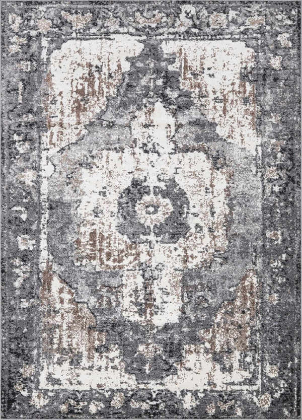 Close-up of the Newalla Area Rug showing its traditional, distressed pattern in camel, charcoal, gray, and ivory tones. Design-Rectangle