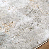 Close-up of the Nurit Sage Thick Luxe Boutique Rug showing its texture and colors: cream, light brown, and light gray. Texture