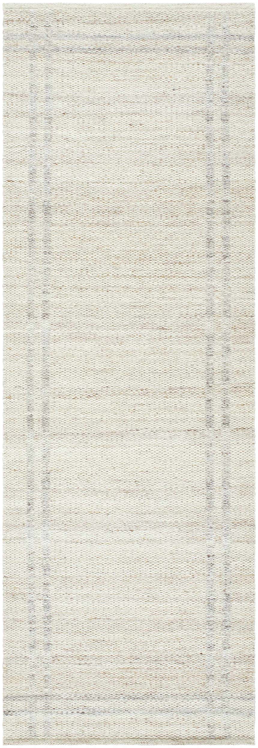 Close-up of the hand woven Nimue Tan Area Rug. Ivory and tan wool rug with subtle stripe border detail. Design-Runner-268