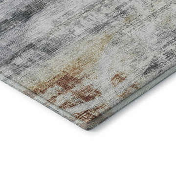 Close-up of the Dalyn Neo NO3 Silver Washable Area Rug. Features caramel, dark brown, light blue, and silver gray colors.