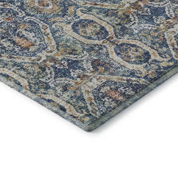 Close-up of the Dalyn Neo NO6 Denim Washable Area Rug. Features beige, caramel, chestnut, denim, and rust colors.