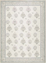 Close-up of Aquene Ivory Washable Area Rug with blush, sage, and blue floral pattern and decorative border. Design-Rectangle-679