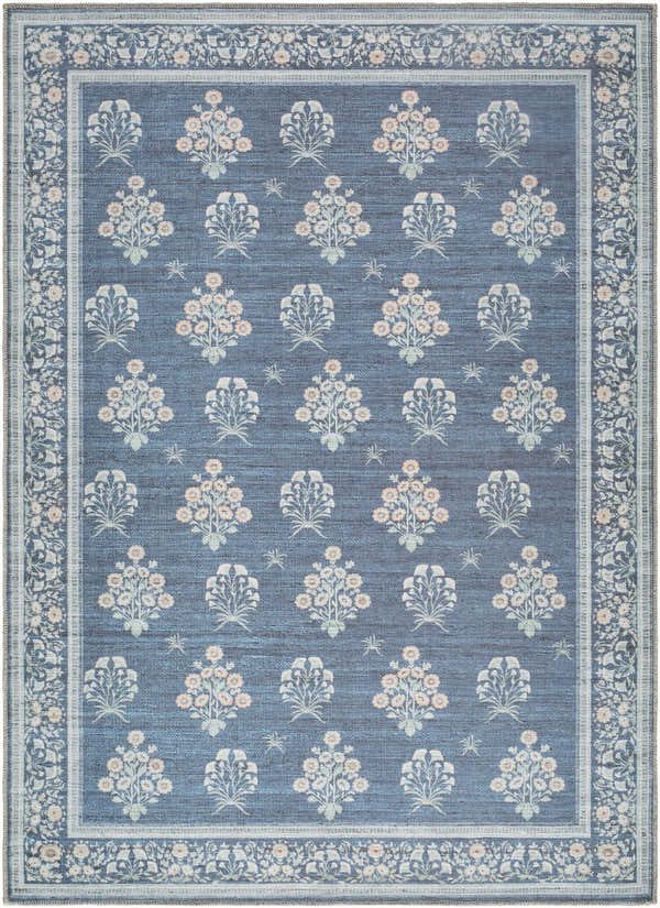 Close-up of the Aquene Denim Washable Area Rug. Features a denim blue background with ivory, sage, and soft peach floral pattern. Design-Rectangle-537