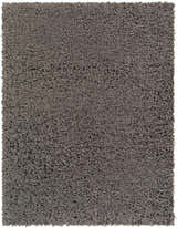 Close-up of the Siari Solid Charcoal Shag Rug, showing its soft, dense, and textured polyester pile. Design-Rectangle-537