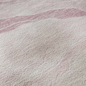 Close-up of the Dalyn Pacifica PA6 Pink Washable Area Rug, showing its blush pink and light purple textured design.