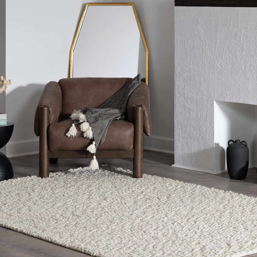 Penmaen Solid Cream Hand-Woven Wool Rug