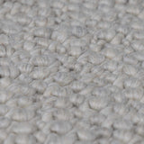 Penmaen Solid Cream Hand-Woven Wool Rug