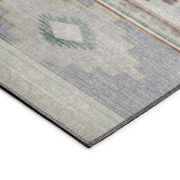 Close up of Dalyn Phoenix PH1 Ivory Washable Area Rug showing Southwestern pattern, beige, gray, and green colors.