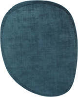 Close-up of the teal blue Anjang Modern Faux Silk Rug, showing its soft texture and unique, rounded rectangular shape. Design-Custom