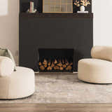 Living room scene with a Pialba Thick Luxe Abstract Smokey Rug, fireplace, and cream boucle chairs. Swatch