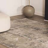 Close-up of the Pialba Thick Luxe Abstract Smokey Rug. Abstract design in taupe, gray, and white. Luxe texture. Swatch