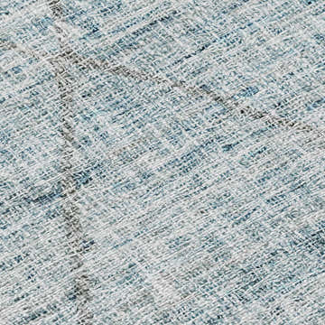 Close-up of the Dalyn Luxury Portico PO1 Teal Washable Area Rug. Shows texture and pattern in aqua, beige, and gray.