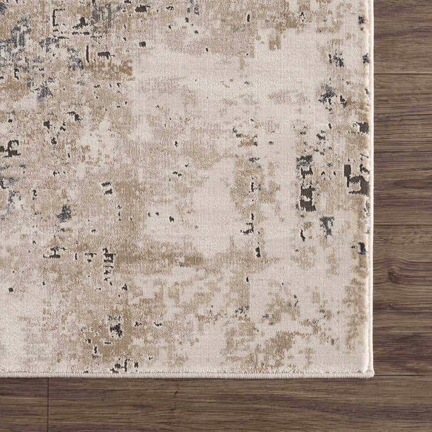 Close up of the Pewamo Area Rug showing its beige, tan, charcoal, and black contemporary design. Swatch