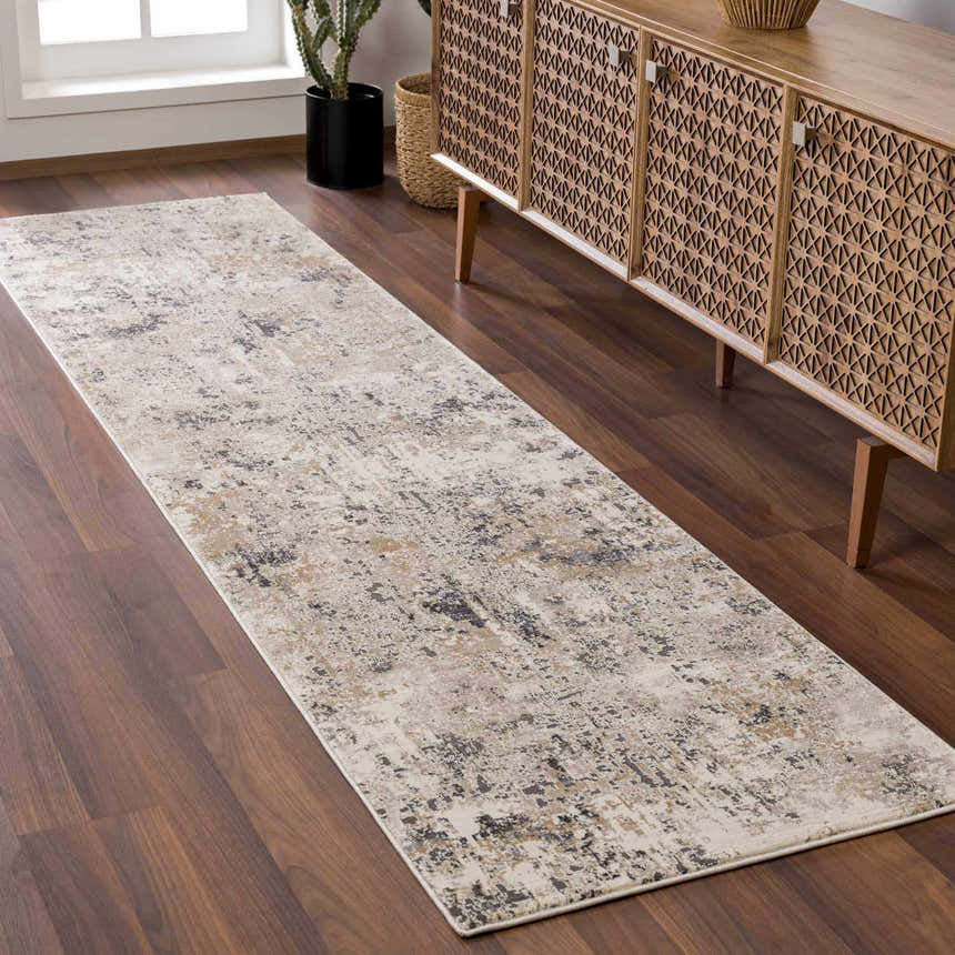 Hallway scene with Pewamo runner rug in beige, tan, brown, and black. Wood floors and mid-century modern cabinet. Roomscene-Runner