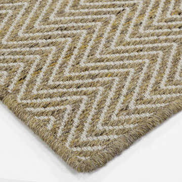 Close-up of the hand-loomed Dalyn Provo PV2 Gold Area Rug, showing the chestnut and gold chevron pattern and textured weave.