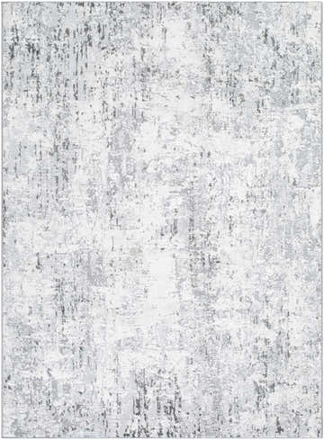 Close-up of the Avital Area Rug featuring a contemporary abstract design in shades of gray, charcoal, and white. Design-Rectangle-537