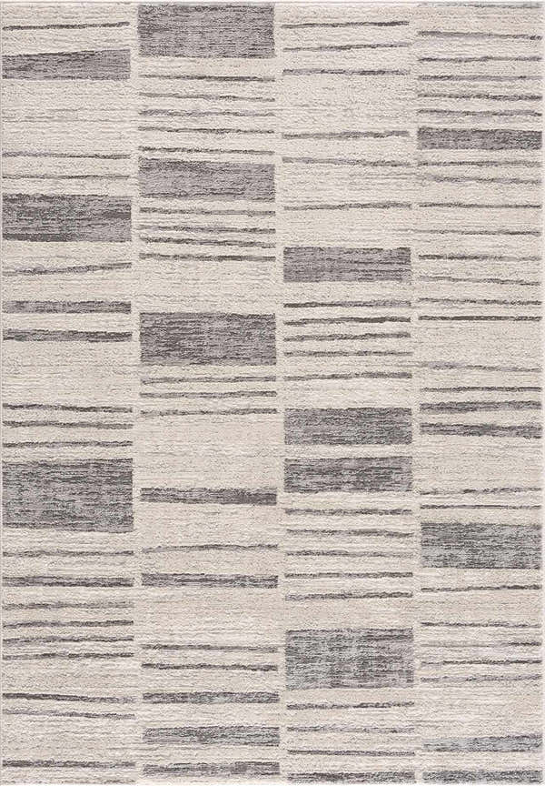 Close-up of Allete Broken-Striped Area Rug. Contemporary design with ash, light silver, and slate blue stripes and blocks. Design-Rectangle-5373