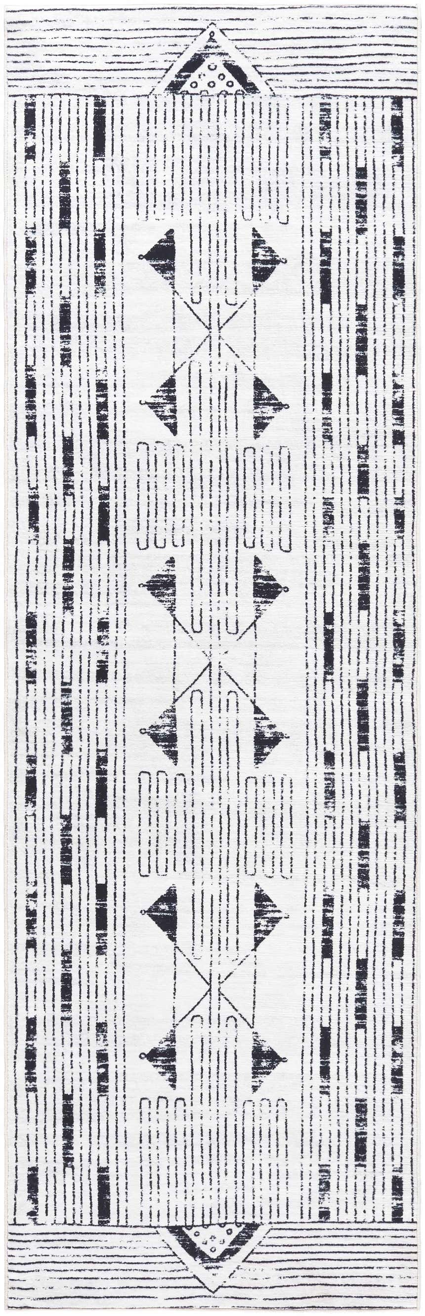 Close-up of the Regis Washable Area Rug. Farmhouse style rug with gray geometric pattern on a light silver and white background. Design-Runner-268