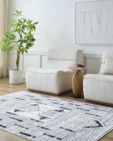 Living room scene with white chairs and a Regis Washable Area Rug in gray, light silver, and white. Farmhouse style. Roomscene-Rectangle