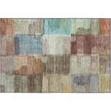 Close-up of Dalyn Luxury Ravenna RN10 Putty Washable Area Rug. Beige, coral, gold, and teal patchwork design. Farmhouse style.