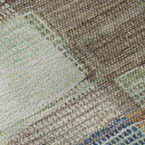Close-up of Dalyn Luxury Ravenna RN10 Putty Washable Area Rug. Beige, teal, and gold geometric pattern.