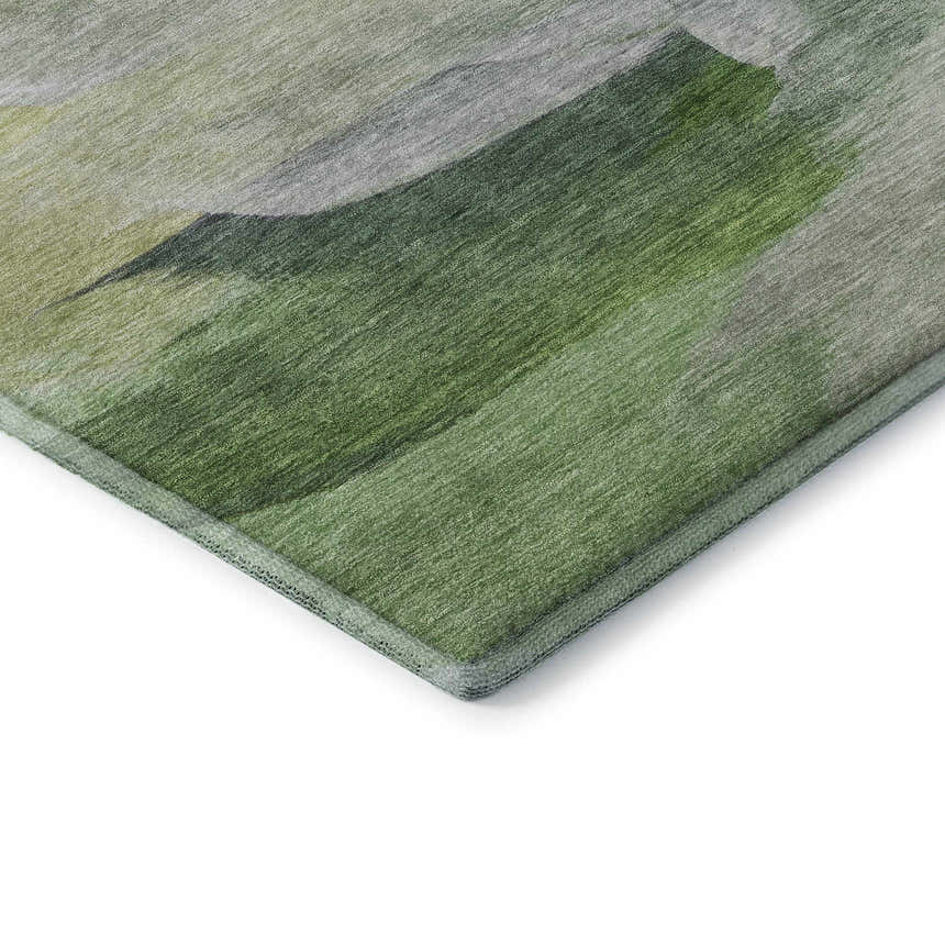 Close-up of the Dalyn Luxury Ravenna RN11 Aloe Washable Area Rug, showing green, taupe, and aloe colors.