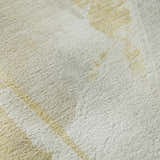 Close up of the plush texture and beige pattern on the Dalyn Ravenna RN7 Washable Area Rug.