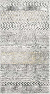 Close-up of the Rombauer Area Rug featuring charcoal, gray, and mustard geometric patterns. Contemporary style. Design-Rectangle